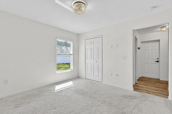 Building Photo - Modern 4-Bedroom, 3-Bath Home with Private In-Law Suite – Palm Coast, FL