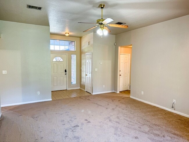 Building Photo - This beautiful 3 bedroom 2 bath home, is located just minutes from shopping, airport, hospitals a...
