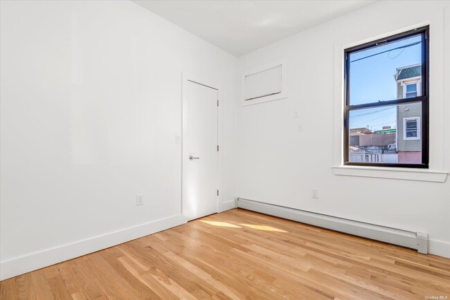 Building Photo - 61-21 55th St