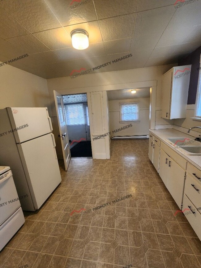 Building Photo - STATUS: AVAILABLE  | R209A | $1795