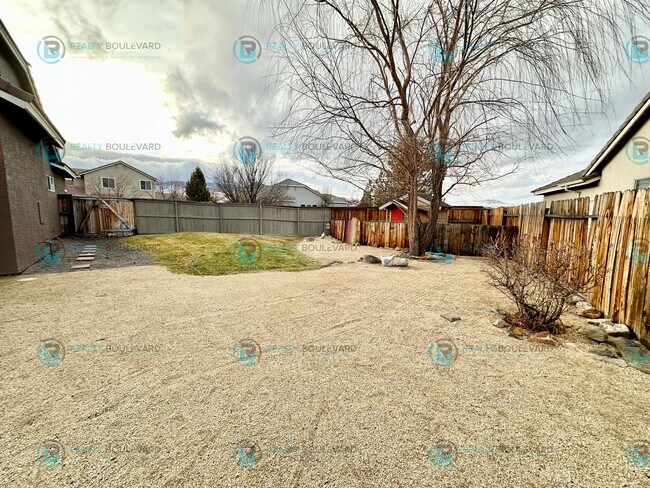 Building Photo - Open Kitchen, Expansive Living, and Covered Patio in Tranquil South Reno Near Trails, Parks & Sho...