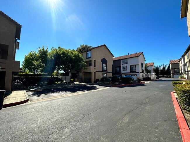 Building Photo - Gated Hayward Townhome with 2-Car Garage & Private Patio