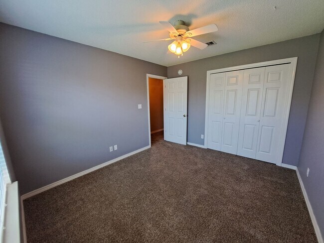 Building Photo - 4BR/3BA with privacy fenced backyard