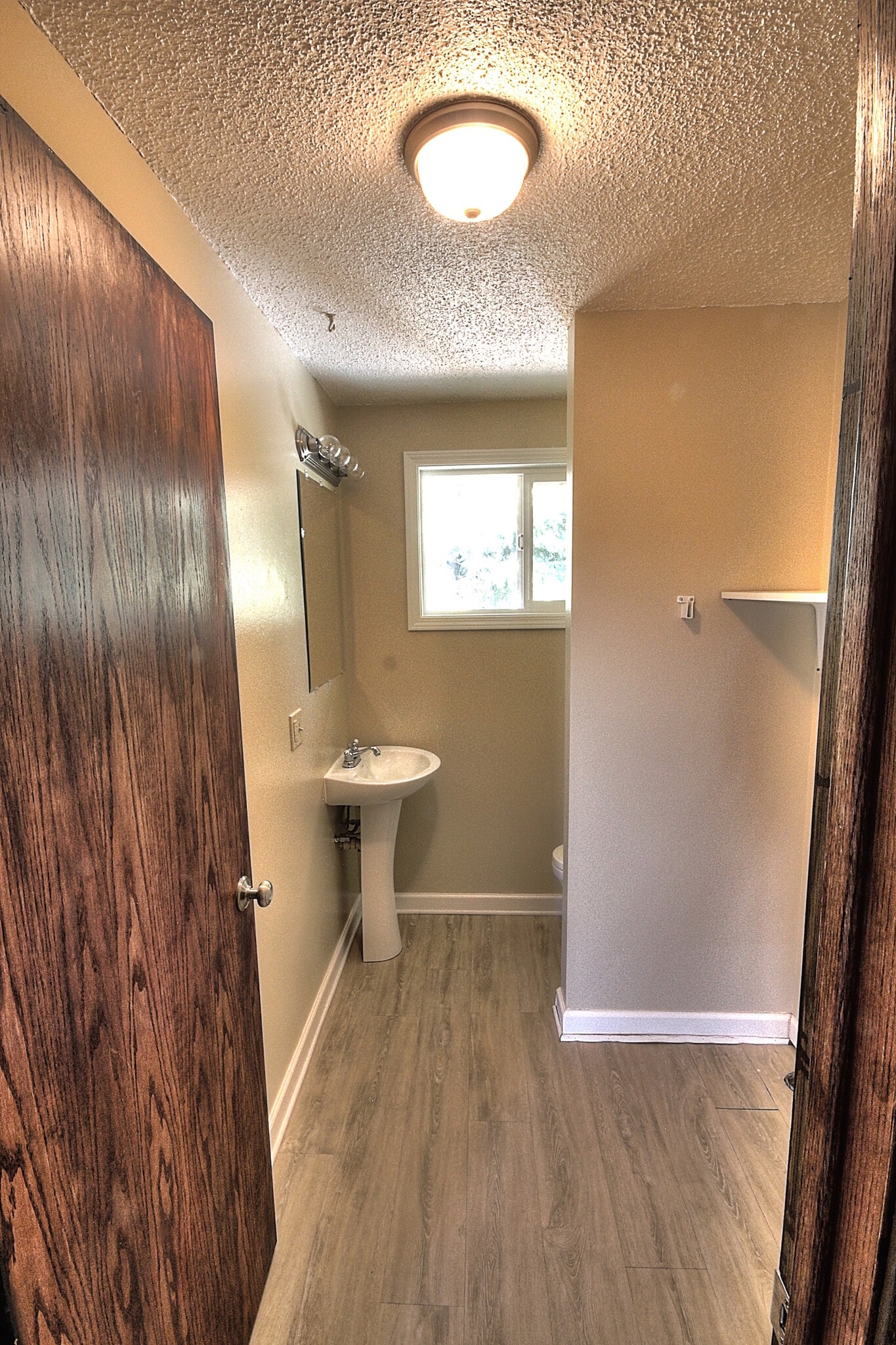 Half Bath and Laundry room - 334 Harrison Boulevard