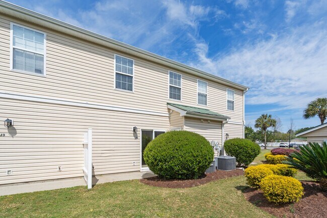 Building Photo - Where your commute is shorter than the Starbucks drive-thru line on 501. Grab the keys before som...