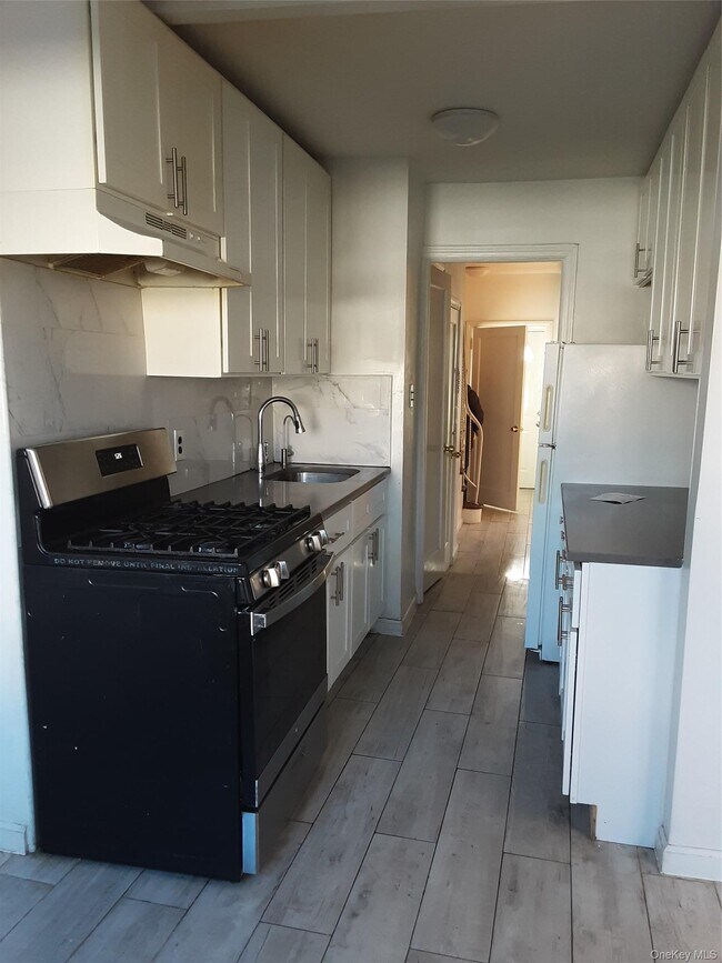 Building Photo - 76-25 167th St