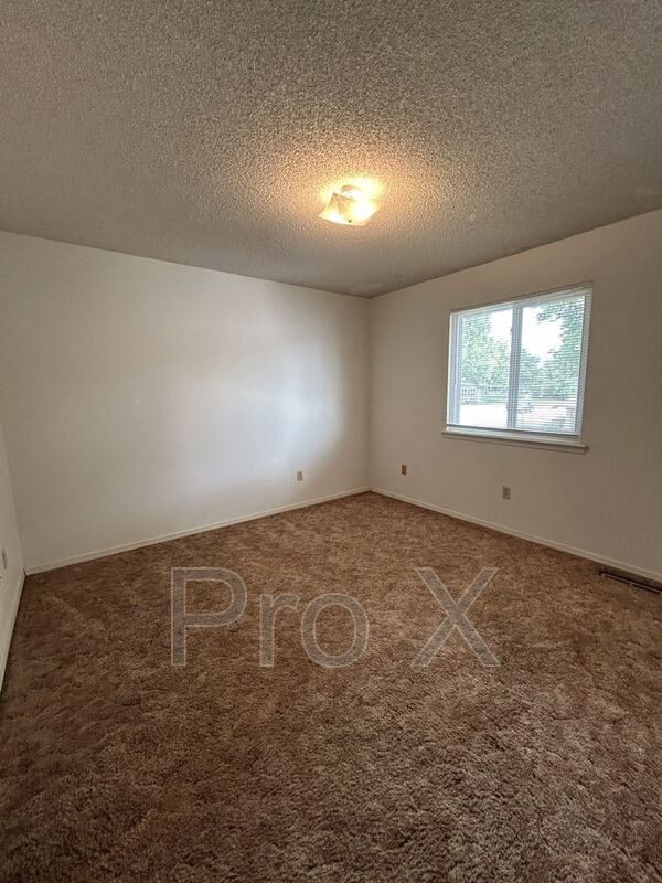 Building Photo - 1108 S Joplin St