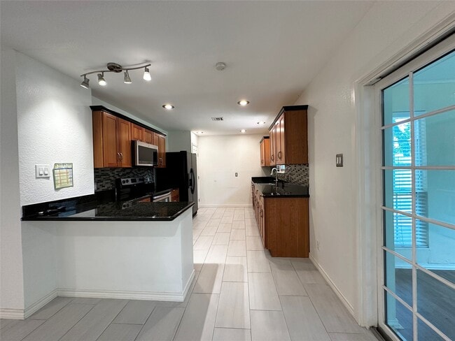 Building Photo - 9626 Highmeadow Dr