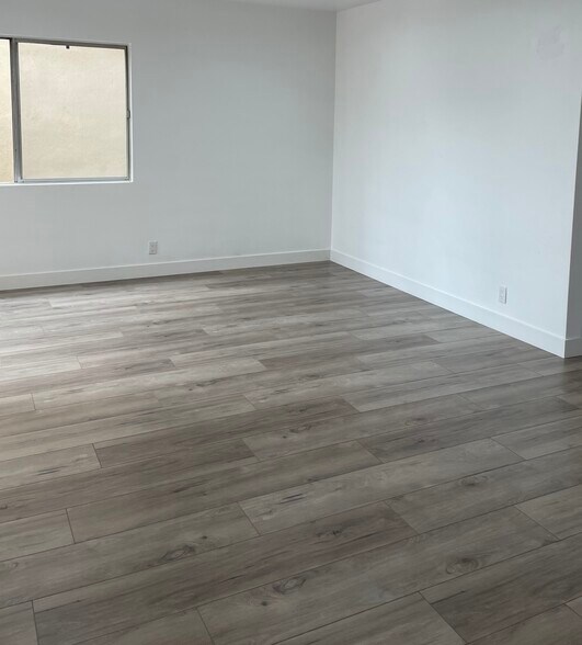 From the lower floor up to second comes with beautiful new flooring - 7349 Balboa Blvd