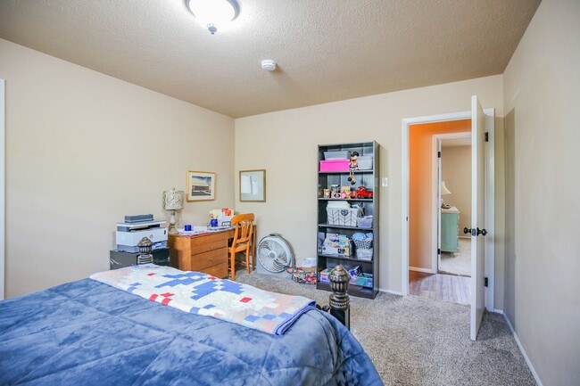 Building Photo - Three Bedroom Home with Plush Backyard
