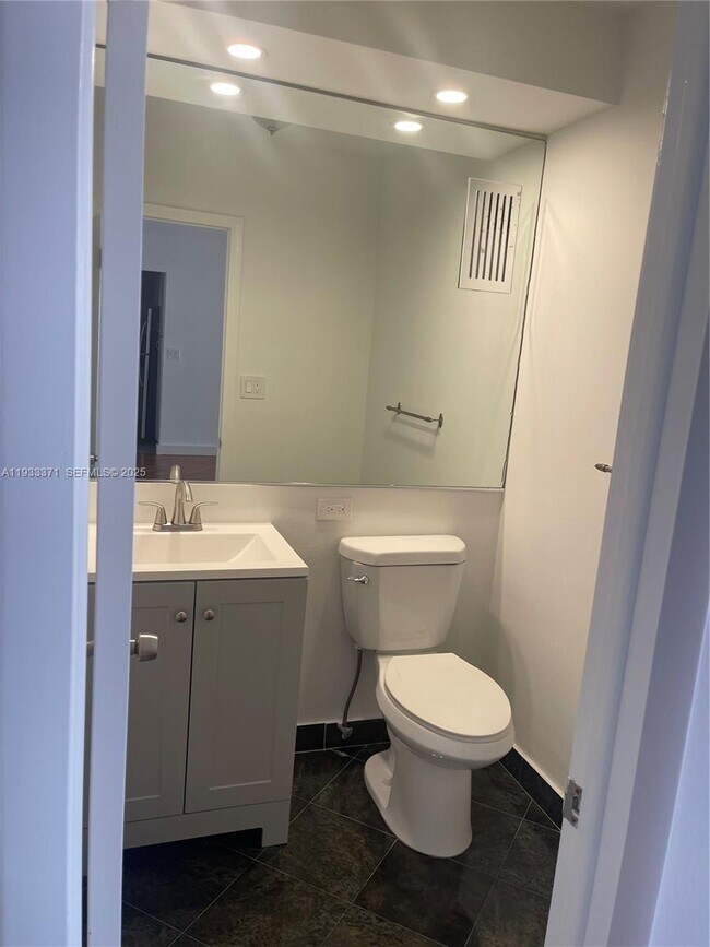 Building Photo - 5005 Collins Ave