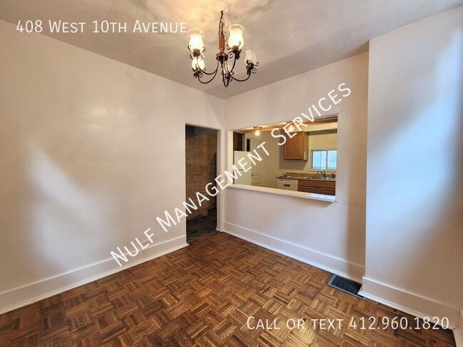 Building Photo - 408 W 10th Ave