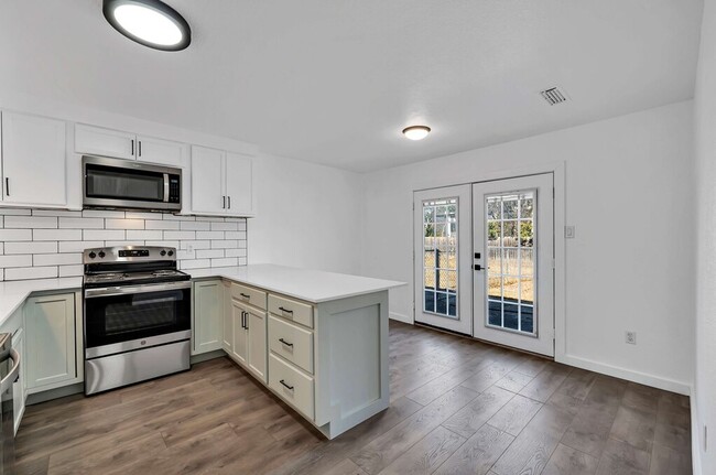 Building Photo - 5311 Tennyson Dr