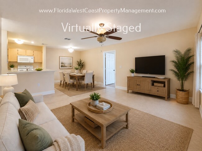 Building Photo - MOVE IN READY! LARGE 2 BEDROOM/2 BATH PLUS ATTACHED GARAGE! TILE/LVP THROUGHOUT!