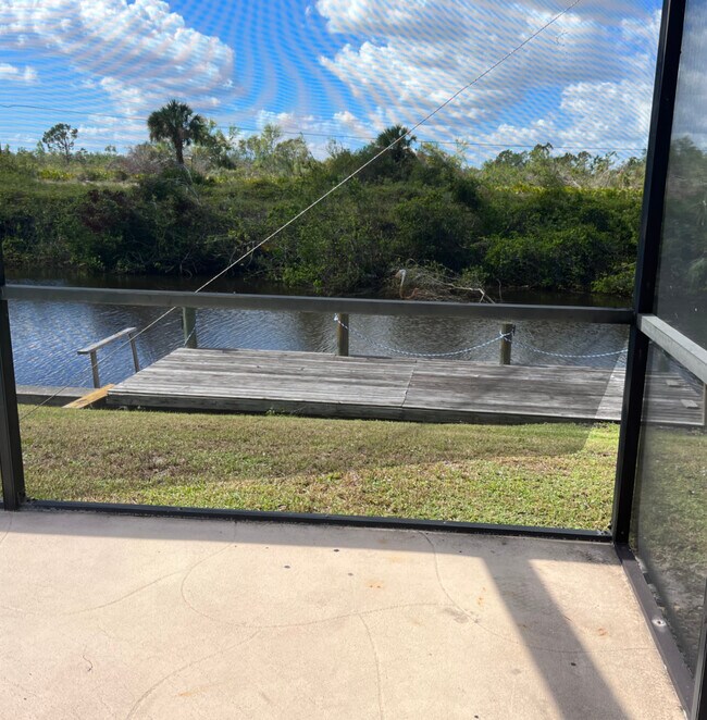 A dock to enter your boat or kayak or to fish off of - or simply watch marine life passing by - 3193 Desoto Dr