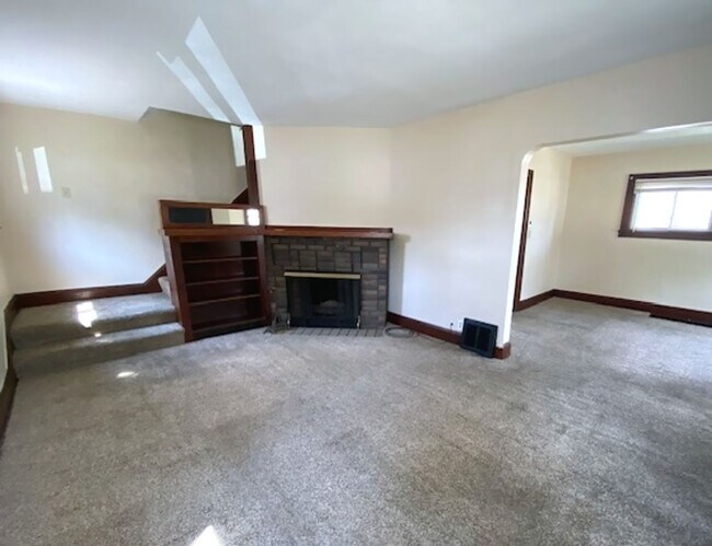 Building Photo - Warm & Bright West Akron 3BR with Fireplace, Off-Street Parking & Backyard