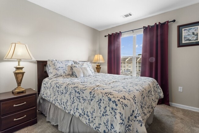 Building Photo - Welcome to Coastal Living at Harbor Landing Condominiums!