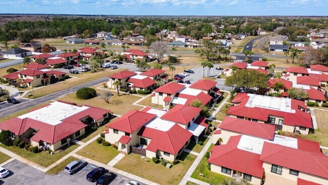 Building Photo - Spanish-Style 3 Bedroom, 2.5 Bath Mediterranean Rooftop Townhouse – Basic Cable & Wi-Fi Included!