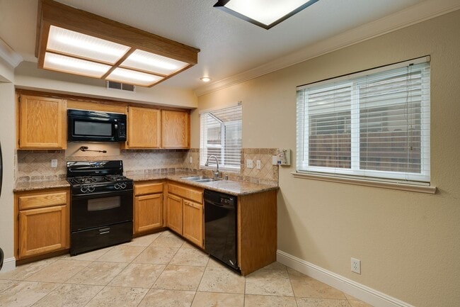 Building Photo - 3-Bed, 2.5-Bath Antelope Home with Vaulted Ceilings & Spacious Yard