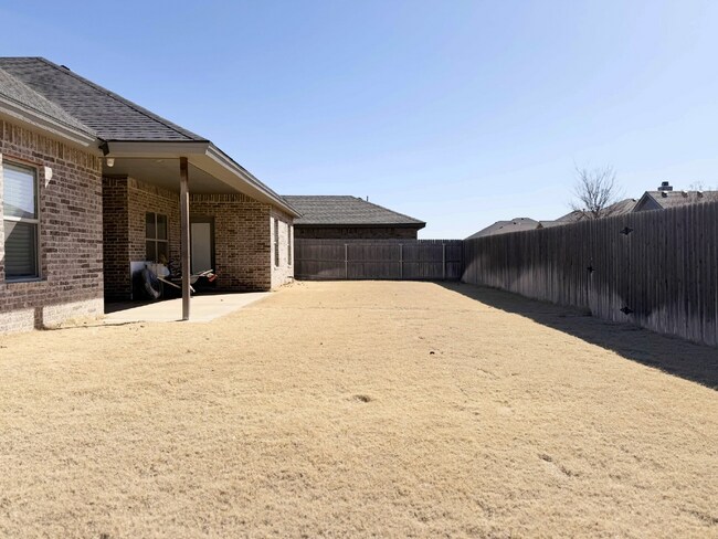 Building Photo - South Lubbock Home with Open Layout, Fireplace & Covered Patio