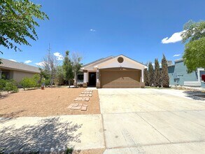 Building Photo - East El Paso 3 bed Refrig A/C with Gorgeous Yard!