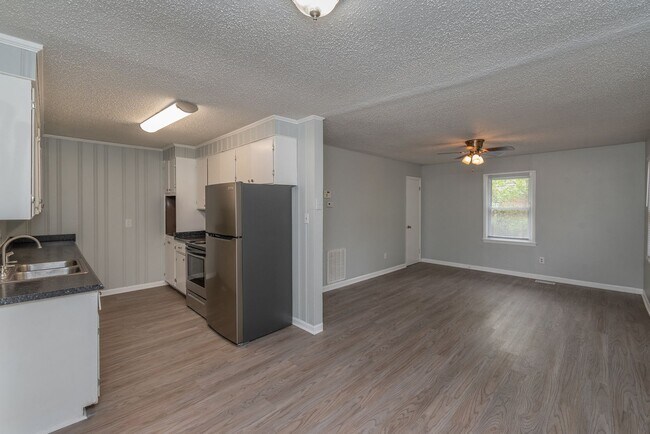 Building Photo - Freshly Updated 3BR with New LVP Flooring, Energy-Efficient Windows & Spacious Fenced Backyard