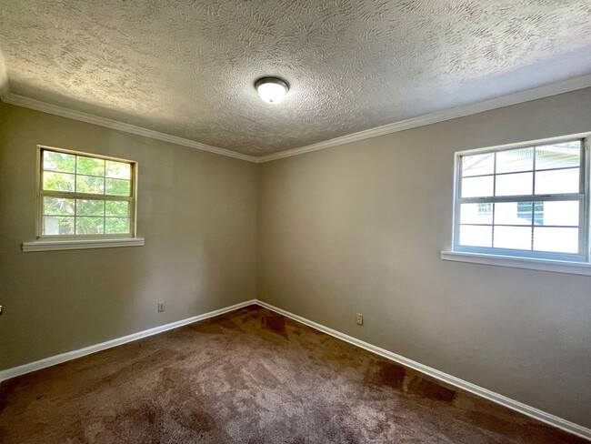 Building Photo - Unwind In Style