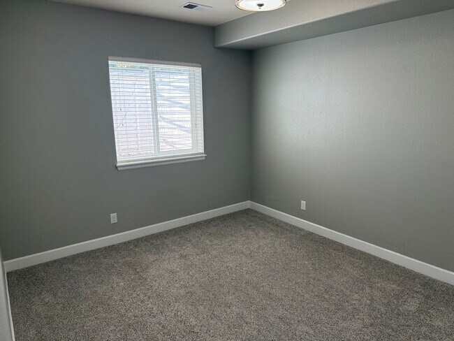 Building Photo - Greenbelt-Backed Wheatlands Home - Mountain Views, 3 Car Garage & Finished Basement
