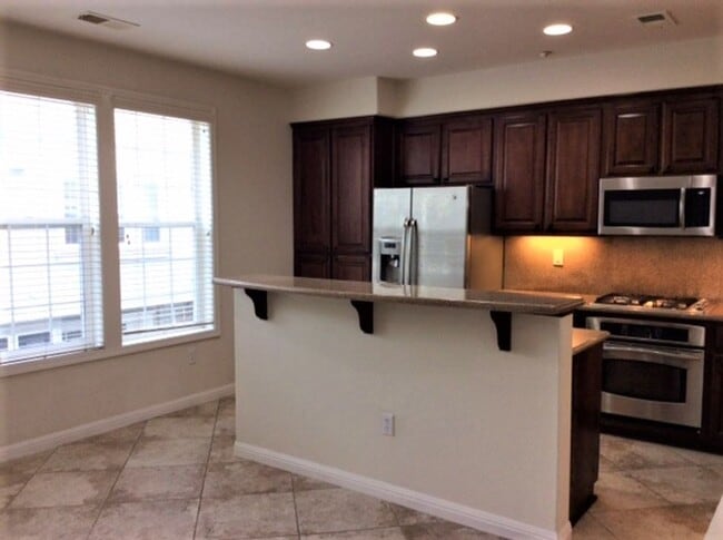 Building Photo - Elevated Living: Spacious, Stylish, & Soph...