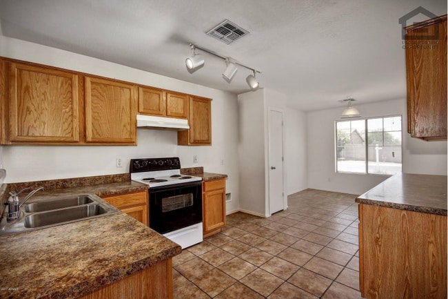Building Photo - 7407 S Sunrise Way
