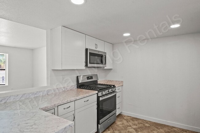 Building Photo - 2699 Smoketree Ave N