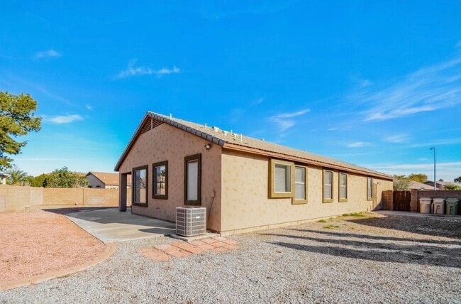 Building Photo - 8704 N 58th Dr