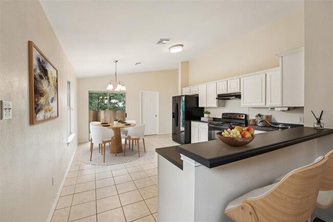 Building Photo - 11201 Canterbury Tales Ln