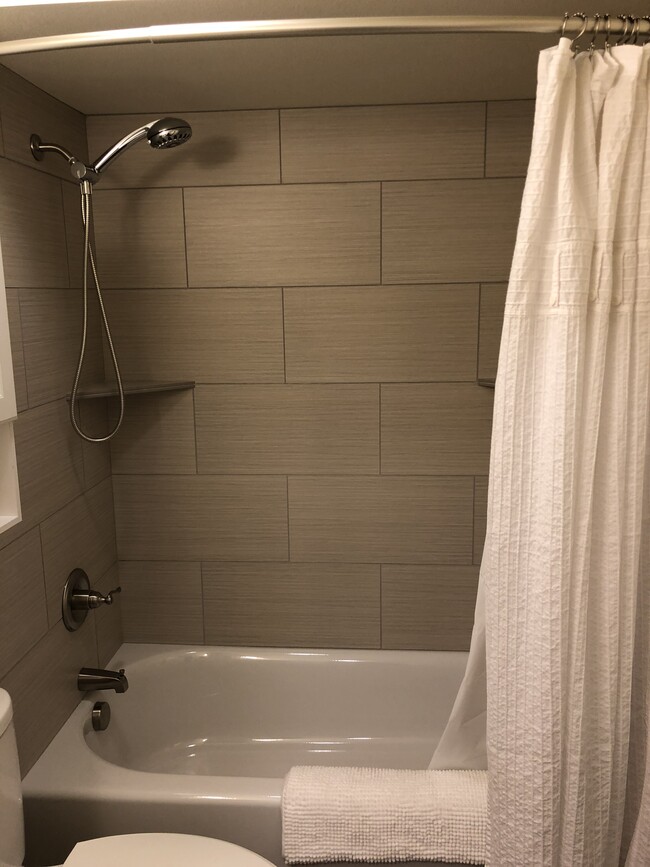 Beautifully tiled bathtub/shower - 6315 NE 36th Ave