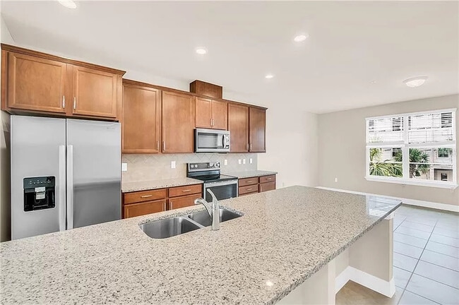 Modern Kitchen equipped with high end appliances - 13334 Bovet Ave