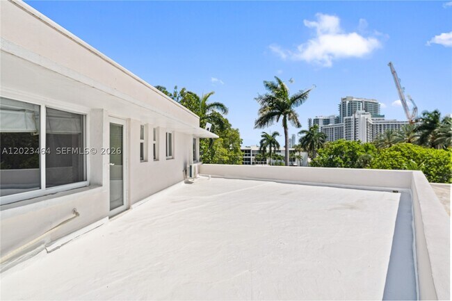 Building Photo - 10190 Collins Ave