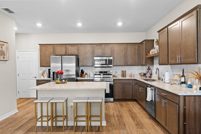 Building Photo - 3BR Center Lake Townhome | 2-Car Garage, Loft & Resort-Style Amenities