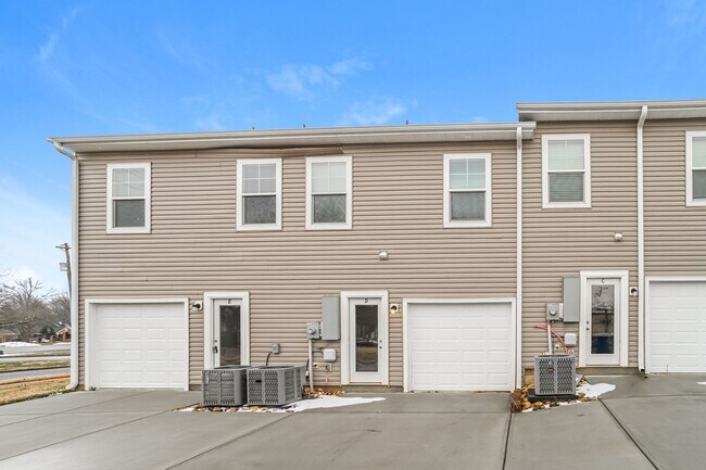 Building Photo - FIRST MONTH FREE - 3BR Townhome • Full Kitchen • Garage + Driveway