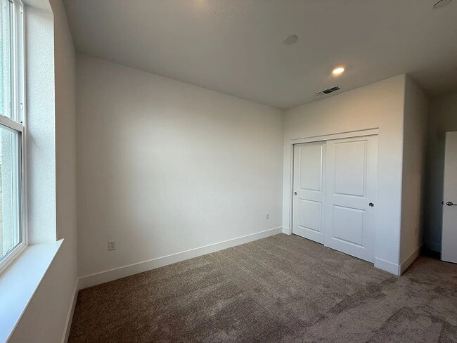 Building Photo - Be the first to enjoy this beautiful, newly built home near the Wild Hawk Golf Club