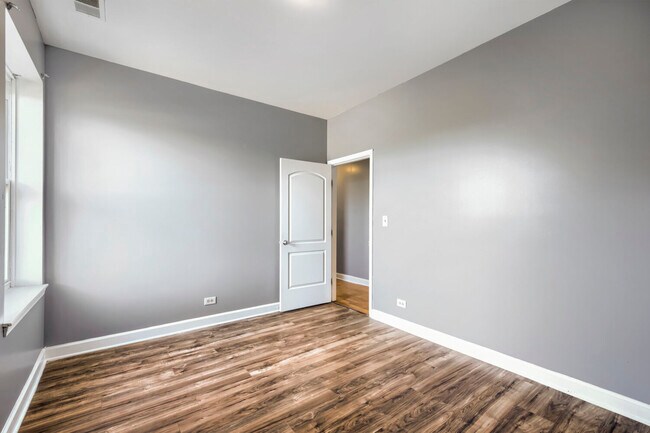 Building Photo - 7724 S Cornell Ave