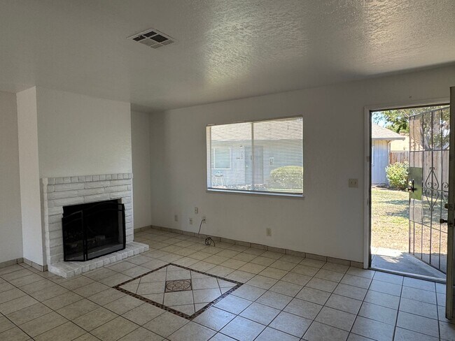 Building Photo - Two Bedroom Triplex with One Bathroom and ...