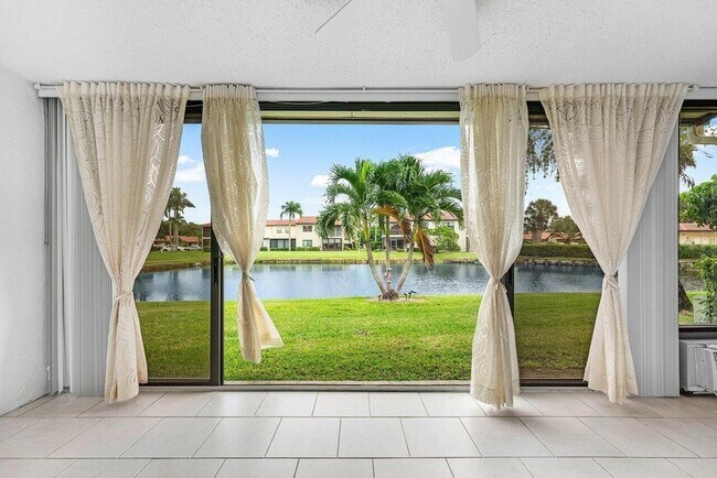 Building Photo - 8566 Casa Del Lago