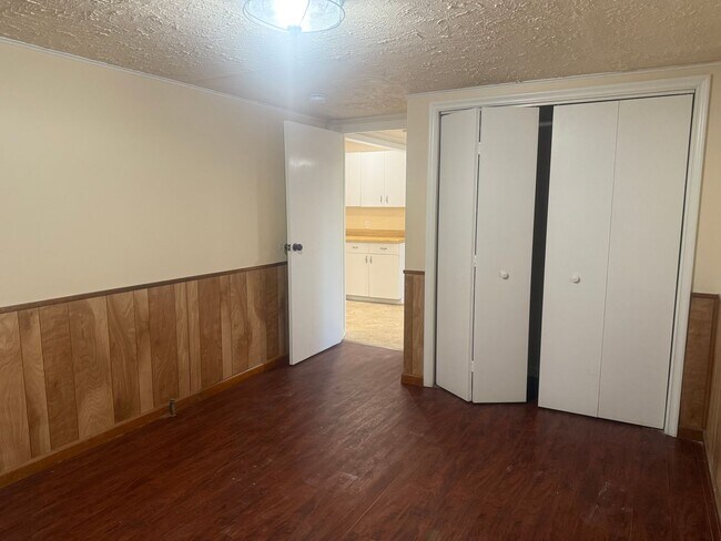 Building Photo - Step into this beautifully updated 1950's gem, where charm meets modern convenience