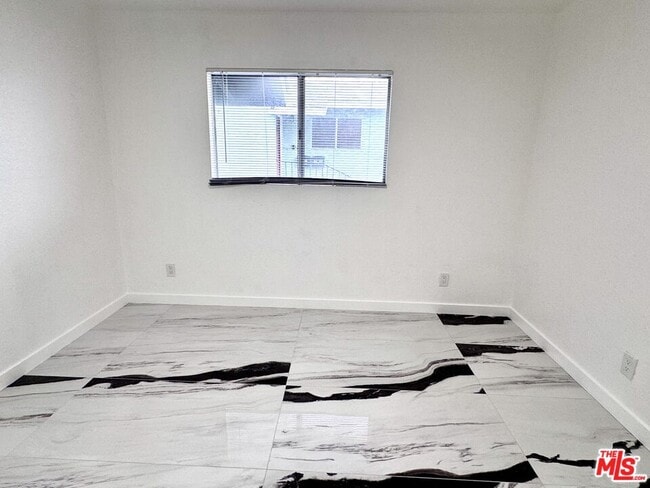 Building Photo - 1630 W 104th St