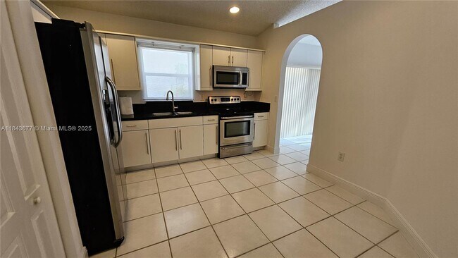 Building Photo - 5084 NW 112th Ct