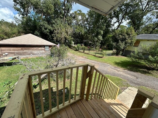 Building Photo - Freshly Painted 2x1 with Brand-New Plank Floors