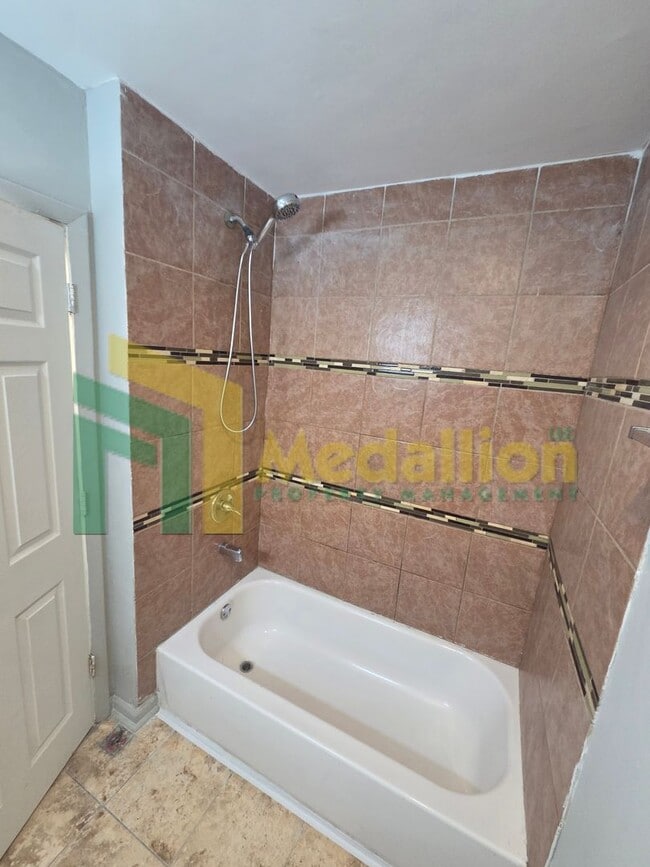 Building Photo - Updated 5-Bedroom Home with Finished Basement and Fenced Yard