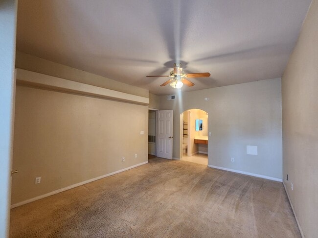 Building Photo - 2nd Story Condo in gated community close to the pool.