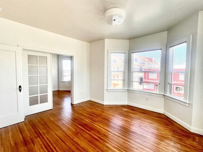 Building Photo - Fully Renovated Bright Corner Apartment wi...