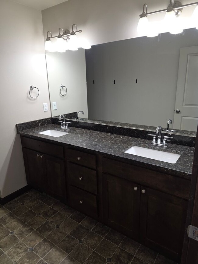 Building Photo - $500 OFF First Month's Rent! Spacious 3BR/2BA Home in Quiet Belgrade Neighborhood with Fenced Bac...